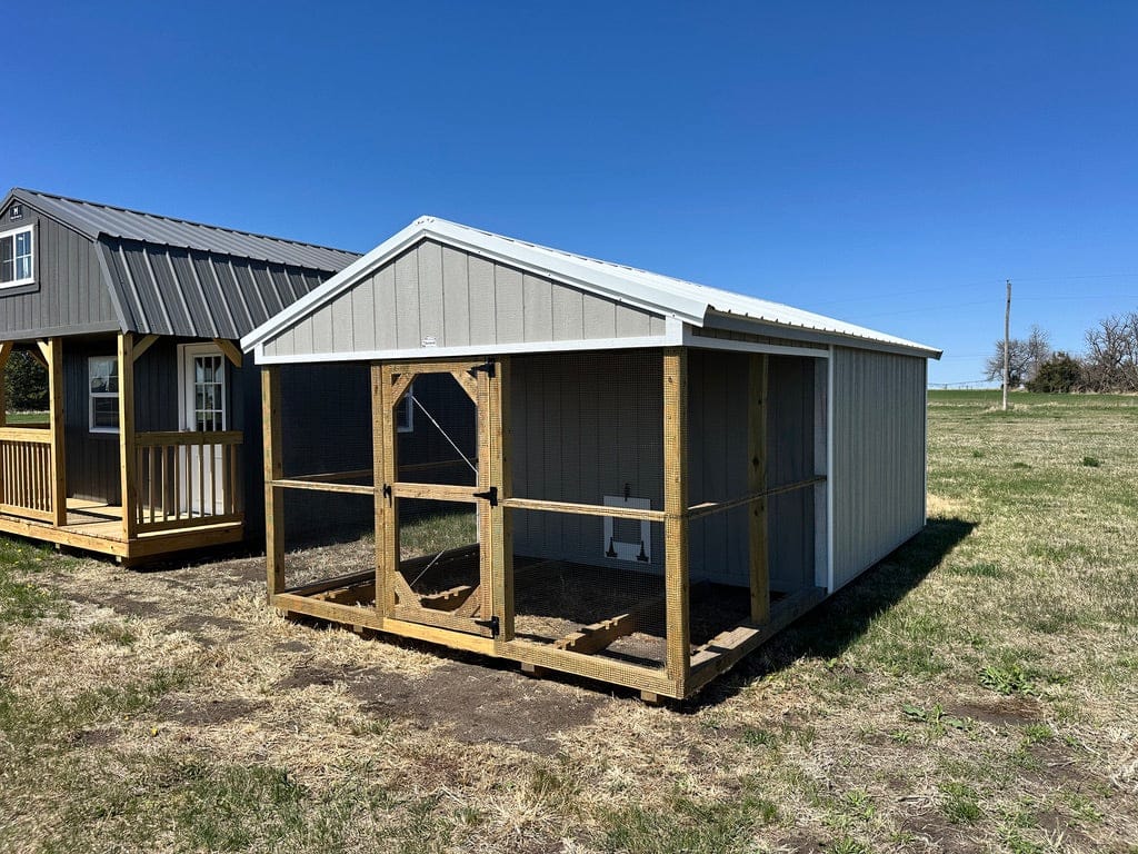 Exterior of chicken coop showcasing front portion covered with chicken wire.