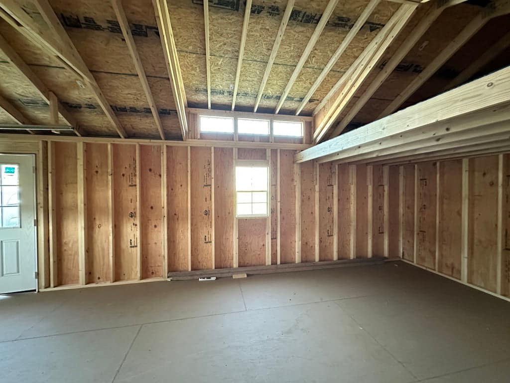 Interior of wood garage building.