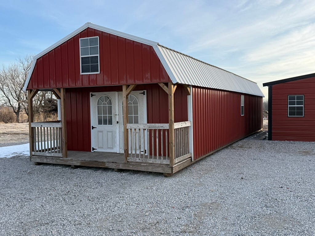 16x48 Lofted Cabin – red metal siding with front porch, Hampton, NE