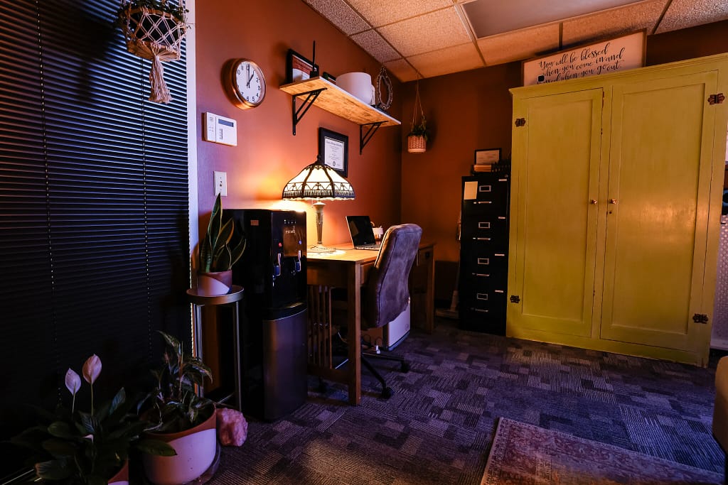 Eva's desk and cabinet with mood lighting.